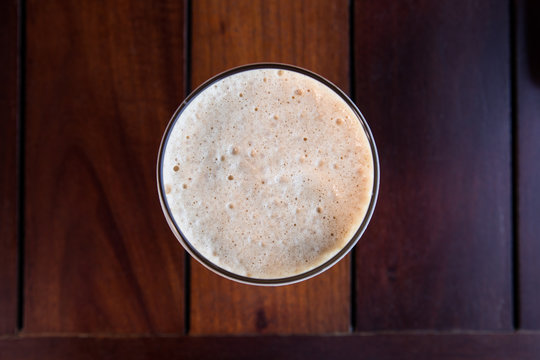 Ice Shake Coffee Topview On Wood Background