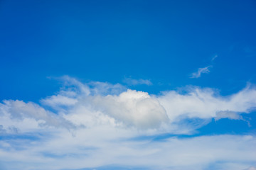 Naklejka na ściany i meble Beautiful blue sky and clouds background.