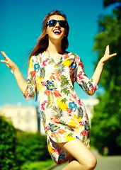 Funny  stylish sexy smiling beautiful young woman model in summer bright hipster cloth dress  in the street