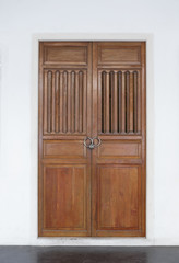 Closed old door in Chinese style on white background