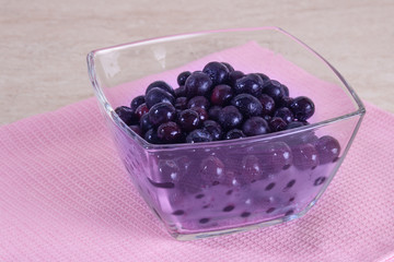 Frozen blueberry in a glass bowl