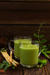 Green pea soup with croutons and cheese.