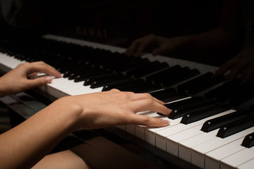 Fototapeta premium Playing piano