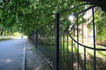 wrought-iron fence in a park
