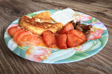 Omelet breakfast snack with cheese and tomatoes