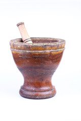 wooden mortar and pestle isolated on white background