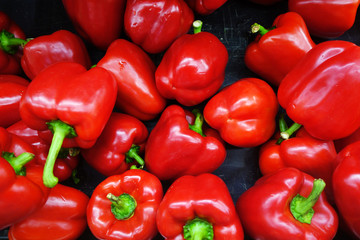 Red bell peppers at a farmers market