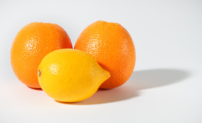 An image of ripe fresh citruses on white background