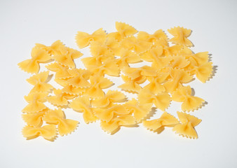 An image of pasta farfalle on white background