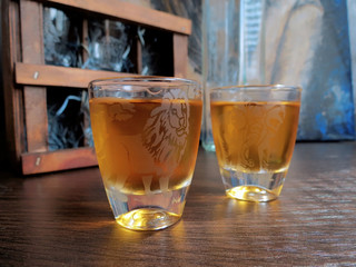 Cognac in etched glass on the table © tishchenko