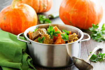 Yellow curry with pumpkin and pork.