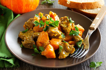 Yellow curry with pumpkin and pork.