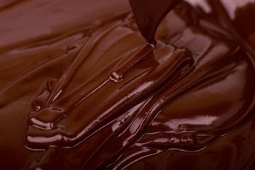 Dark chocolate flowing