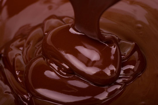 Dark chocolate flowing