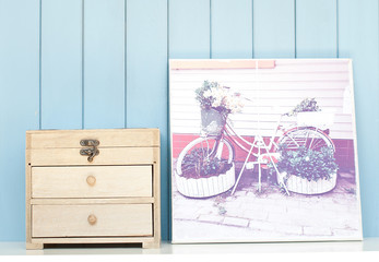 Vintage poster and ancient wooden jewelry box