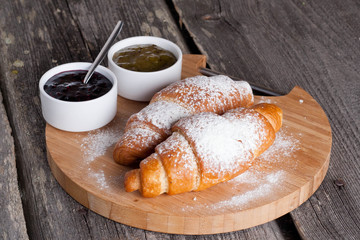 fresh croissants with jam for breakfast