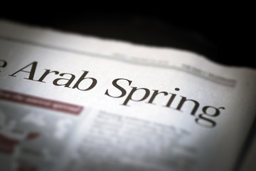 Arab Spring written newspaper.