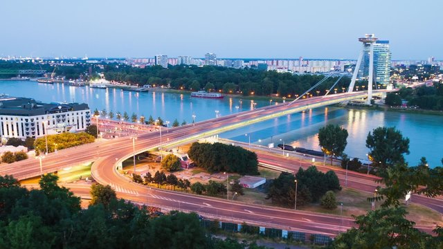 Bratislava time-lapse during sunset, view on SNP bridge and Danube