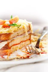 Sandwich with cheese, ham and tomato