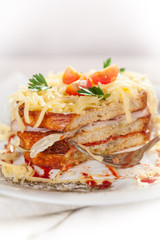 Sandwich with cheese, ham and tomato