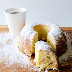Apple charlotte pie on wooden board