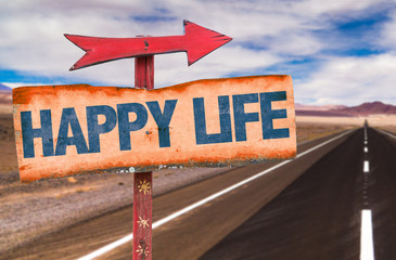 Happy Life sign with road background