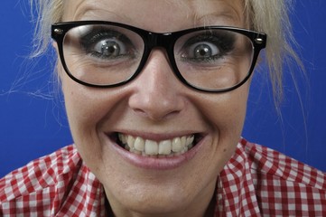 Fototapeta na wymiar Portrait of a blonde woman wearing glasses