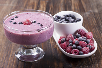  Smoothies of frozen raspberries and   blueberries and   with yo