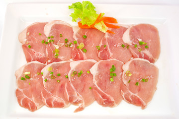 freshness slided pork on white dish for grill