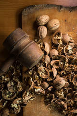 Hammer and cracked walnuts