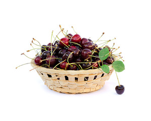 Cherry in bowl isolated on white background