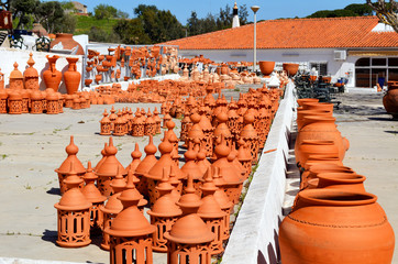 A selection of Algarve terracotta pottery chimneys for sale