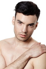 Obraz premium Charming and handsome man face over a white background