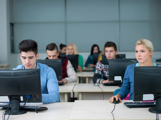students group in computer lab classroom