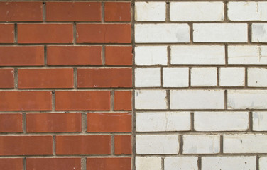 a wall of red and white brick in the mix