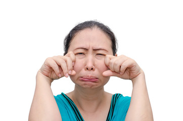 Asian woman crying with funny face over white background