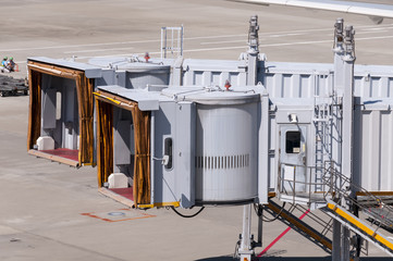 Jet bridges waiting for airplane at airport