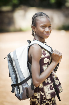 Smiling Beautiful Native African Ethnicity Schoolgirl Posing With Her Sack