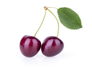 ripe red cherries with leaves isolated