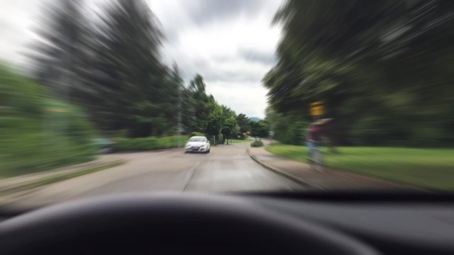 Fast driving in a village - timelapse movie with blur effect