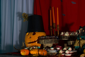 Pumpkins on the decorated table.