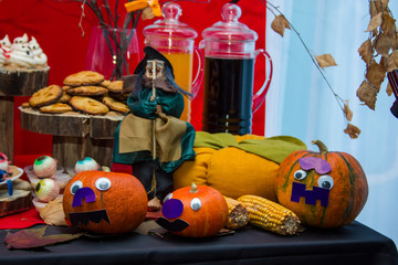 Pumpkins on the decorated table.