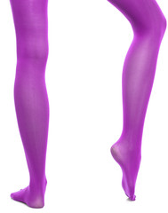 Woman slim legs and violet stockings isolated