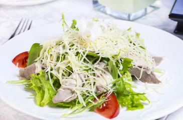 salad with cheese, meat and vegetables