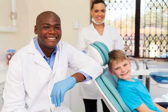 little boy with medical team dental clinic