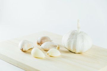 garlic on chopping block