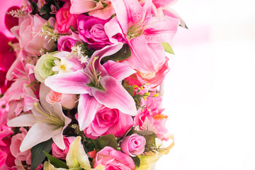 Obraz na płótnie Canvas Close up of colorful artificial bouquet flowers