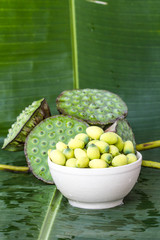 Lotus seed on banana leaf © nawin