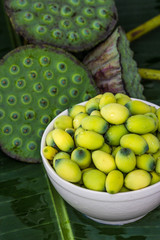 Lotus seed on banana leaf © nawin