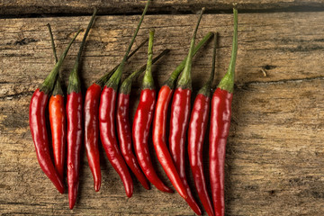 some chili peppers on wood table